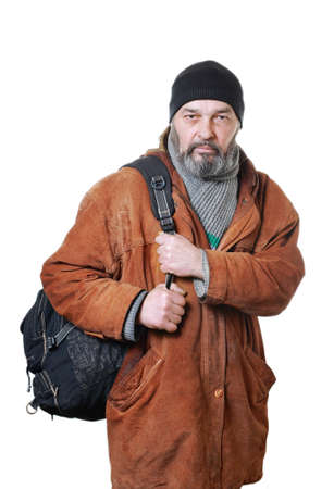 Real man with a beard in a hat and scarf in a brown leather jacket, with a bag on a white backgroundの写真素材