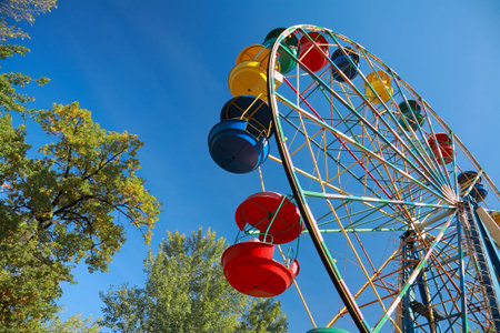 Ferris wheel against the blue sky