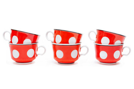Red cups on a white background, a set of six piecesの写真素材