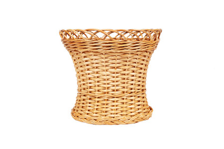 Wicker basket without a handle on a white backgroundの写真素材