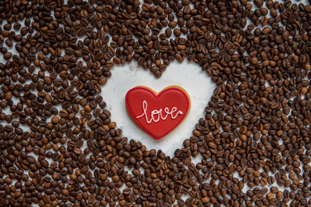 Cookie heart and frame heart from coffee beans top view.の写真素材
