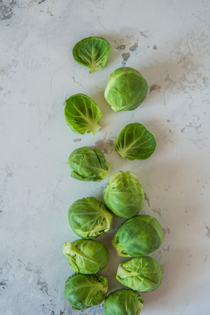 Fresh Brussels sprouts on a white background top view.の写真素材