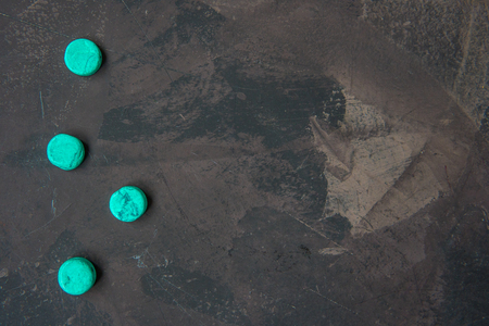 Decorative blue stones on a dark background.の写真素材