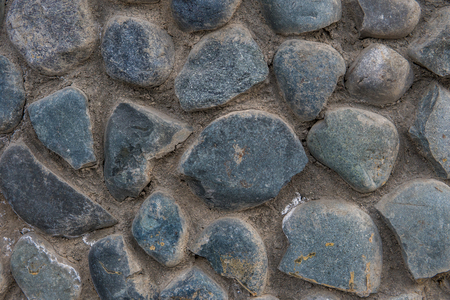 Stone wall background. Texture of natural stones.の写真素材