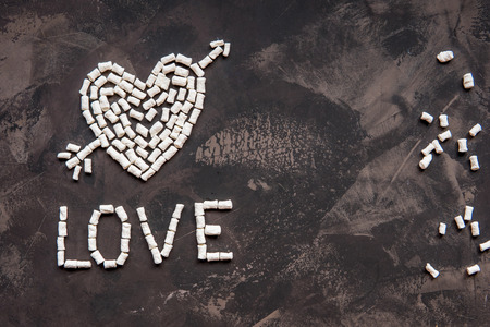 Love text made of white heart marshmallow, decoration for love.の写真素材