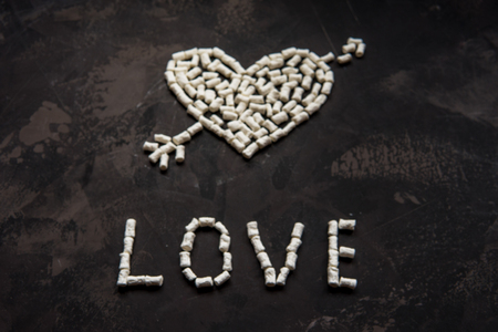 Love text made of white heart marshmallow, decoration for love.の写真素材