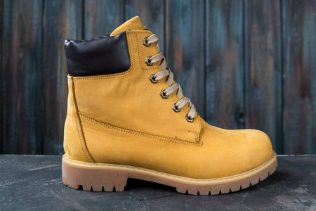 Women's winter boots. Yellow warm boots for trekking.