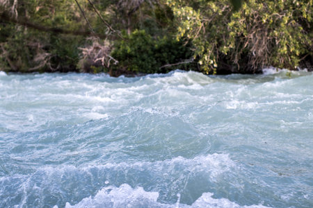 River closeup background. Stormy Chilik River in the steppe of Kazakhstan