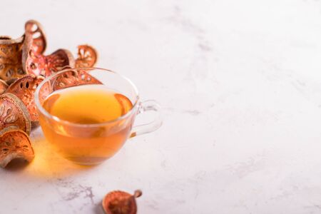 Matum tea. Bael fruit tea and slices of dried bael fruitの写真素材