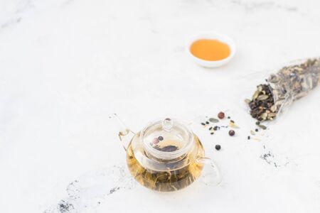 Tea in a glass teapot. Herbal Tea with Berriesの写真素材