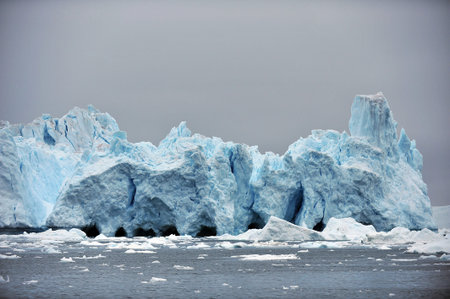 Greenland. Icebergs in the ocean. The nature of the North.
