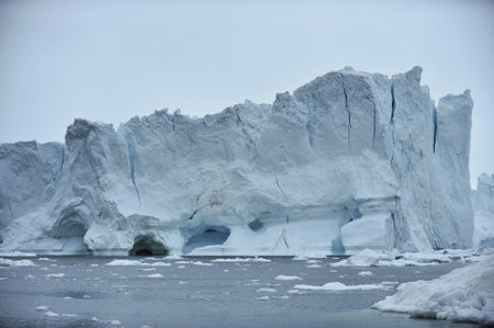Greenland. Icebergs in the ocean. The nature of the North.