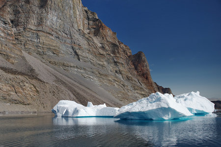 Greenland. Icebergs in the ocean. The nature of the North.