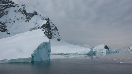 Icebergs and global warming. Greenland Melting Blue Water. Arctic Ice Nature Landscape of Global...
