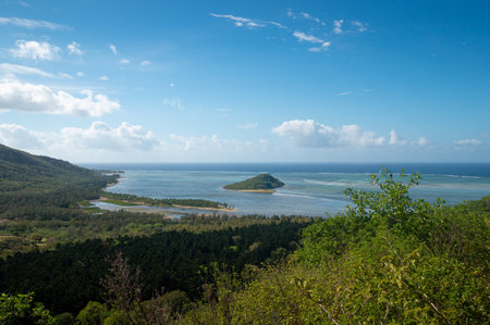 Ocean view at Mauritius over a lonely island in the african ocean at the wonderful vacation...