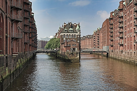 Hamburg, Germany. red houses surrounded by canals and bridges. desaturated.の写真素材