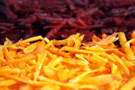 Cutting beetroot and carrot as backgroundの写真素材