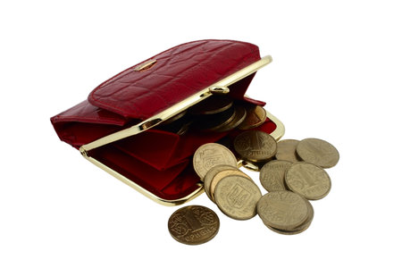 red wallet with coins isolated on whiteの写真素材