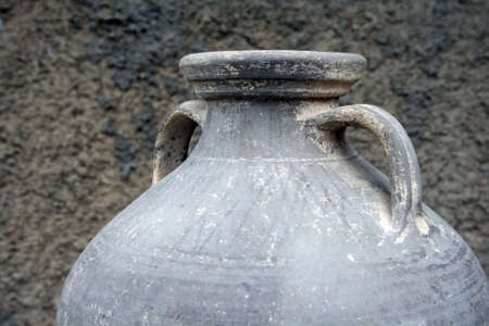 top part of ancient grey amphora for whineの写真素材