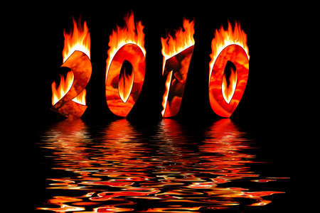 2010 new year numbers in fire reflected in waterの写真素材