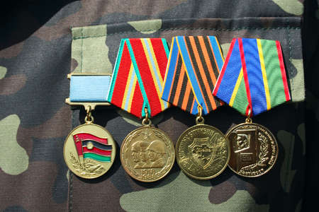soviet and ukrainian jubilee medals for participation in afganistan warの写真素材