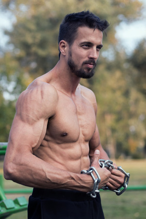 Man with muscular torso. Muscular Man Fitness Model Torso showing.の写真素材