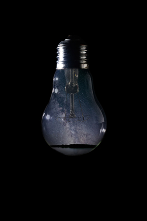 Milky Way galaxy inside of light bulb on dark background
Milky Way galaxy beautiful night skyの写真素材