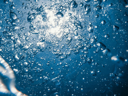 Underwater bubbles with sunlight. Underwater background bubbles.