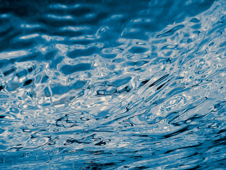 Underwater ripple. Blue water ripples underwater.
