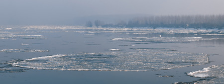 Ice floating in the river. Ice Break up. Big chunk of ice in the river. ice meltingの写真素材