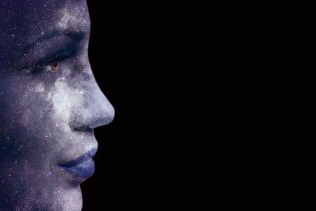 Beautiful girl model with cosmic make-up on face. Creative make-up beauty theme.の写真素材