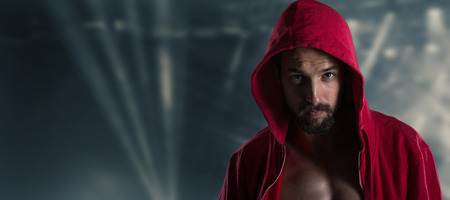 Young man portrait in hooded sweatshirtの写真素材