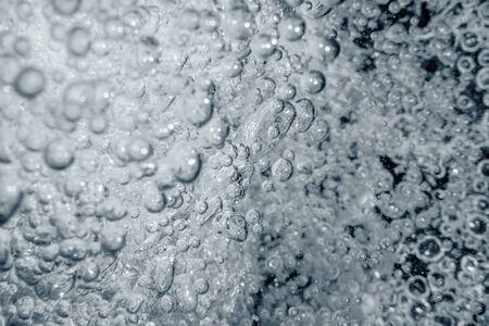 Underwater air bubbles background. Closeup air Bubbles background.の写真素材