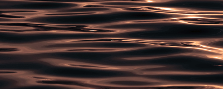 Sunset on the Water surfaceの写真素材
