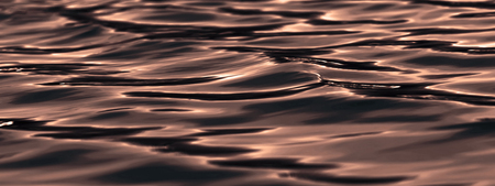Sunset on the Water surfaceの写真素材
