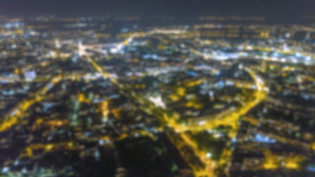 Blurred city lights bokeh. Aerial view urban night light bokeh. の写真素材
