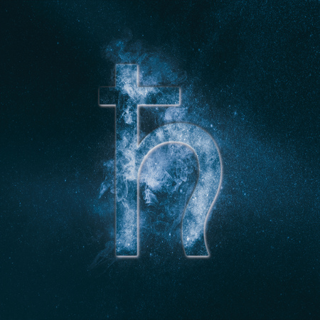 Planet Saturn Symbol. Saturn sign. Abstract night sky background.の写真素材