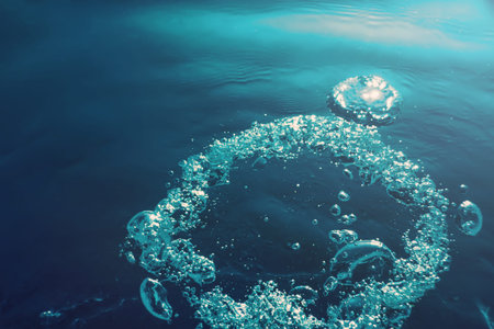 Underwater bubbles with sunlight. Underwater background bubbles.
