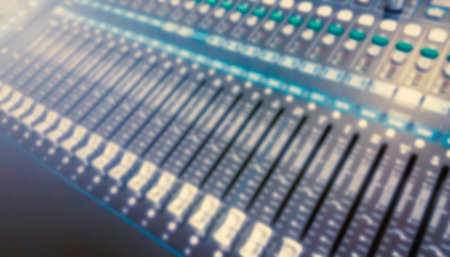 Sound Mixer, Audio Mixer Slide. Music equipment blurred background.