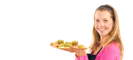 Happy Young woman holding Healthy raw vegan breakfast fresh fruit.の写真素材
