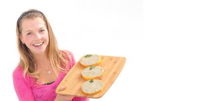 Female holding raw vegan healthy food. Raw Vegan Pumpkin. Raw food concept.の写真素材