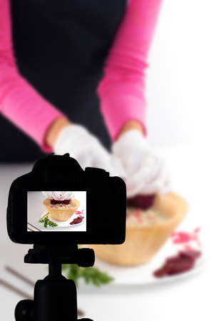 Young woman recording her video blog healthy food preparation, Food Blog conceptの写真素材