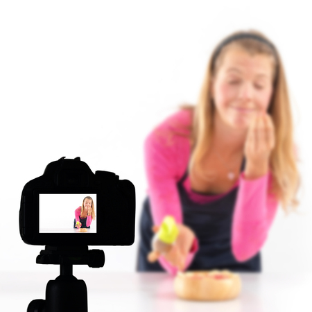 Young woman recording her video blog healthy food preparation, Food Blog conceptの写真素材