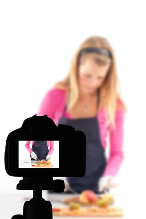 Young woman recording her video blog healthy food preparation, Food Blog conceptの写真素材