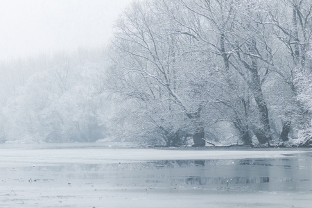 Frozen lake in winter, Winter lake sceneの写真素材