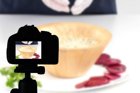 Young woman recording her video blog healthy food preparation, Food Blog conceptの写真素材