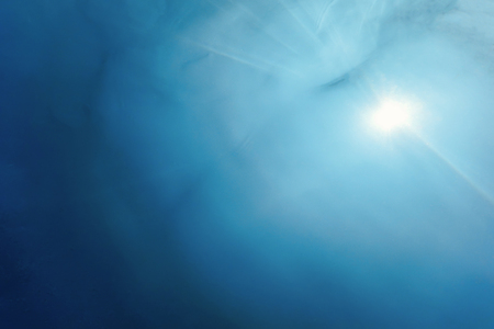 Underwater view of the water surface. Underwater background.の写真素材