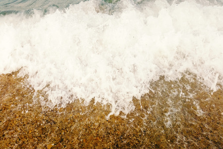 Wave of blue ocean on beach close up Summer Backgroundの写真素材