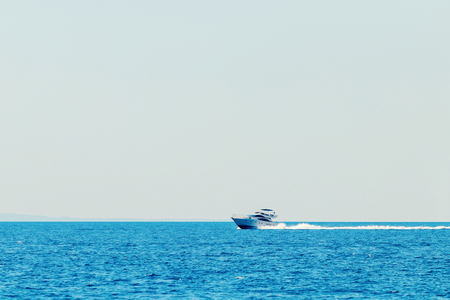 Luxury motor boat cruising in blue sea, Summer vacationの写真素材