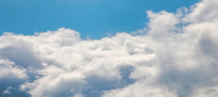 White clouds sky backgroundの写真素材